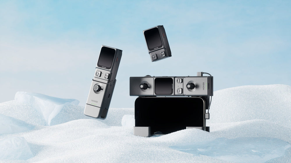 HOVERAir Beacon and JoySticks displayed in a snow environment, featuring standalone use alongside one-handed and two-handed RC controller setups.