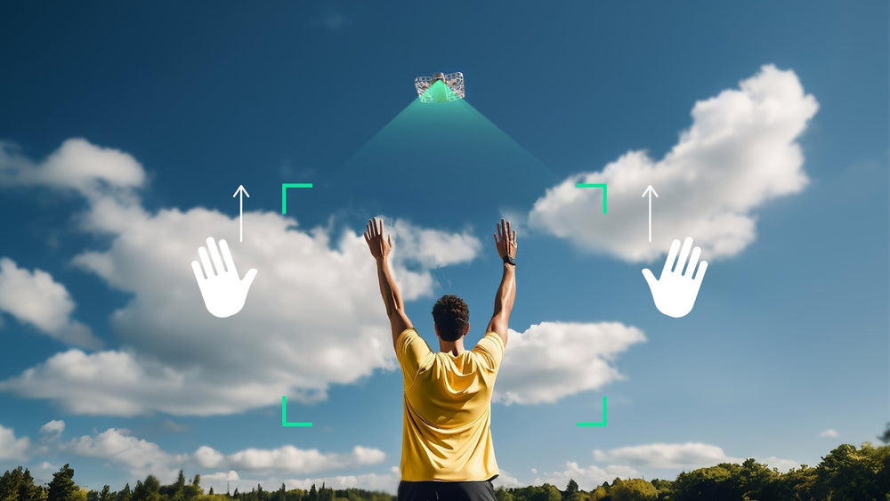 A man is  controlling the drone with gesture