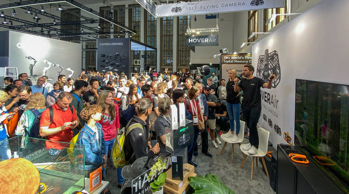 Crowded HOVERAir booth at IFA 2025, showcasing a drone demonstration.