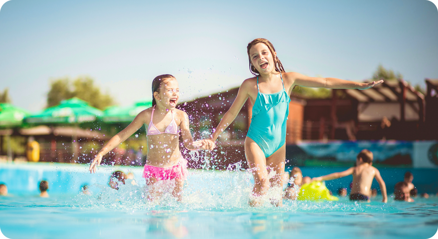 Girls splashing in a water park