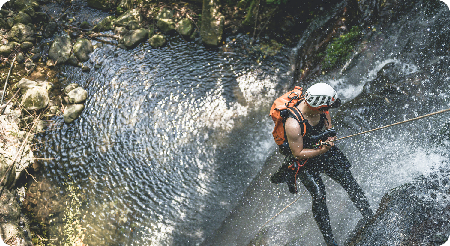 Waterfall rappelling adventure